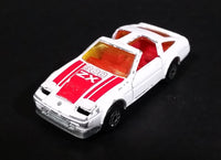 Vintage Majorette Nissan 300 ZX Turbo T-Top No. 241 White with Opening Doors and Moving Headlights 1/62 Scale Made in France - Treasure Valley Antiques & Collectibles