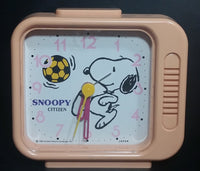 Vintage 1958 Citizen United Feature Syndicate Snoopy Playing Soccer Pink Alarm Clock Collectible - Treasure Valley Antiques & Collectibles