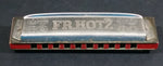 Vintage FR. Hotz Canadian Ace Red Painted Wooden and Metal Harmonica Instrument - Treasure Valley Antiques & Collectibles
