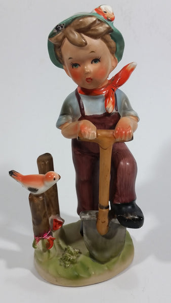Vintage Boy with Shovel Bird on a Post Ceramic Figurine - Hummel Style Japan - Repairs - Treasure Valley Antiques & Collectibles
