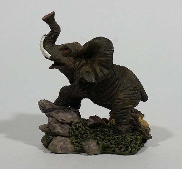 Elephant with Tusks Holding Trunk Upwards Resin Figurine - SABRE - Treasure Valley Antiques & Collectibles