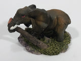 Elephant with Tusks Pulling a Log With It's Trunk Resin Figurine - SABRE - Treasure Valley Antiques & Collectibles