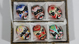 Vintage Set of 6 Hand Painted Miniature Chinese Colored Clay Mud Opera Masks In Light Brown Patterned Hinged Silk Lined Box