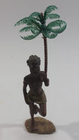 Man Holding a Palm Tree Umbrella While Standing on One Foot Resin and Plastic Figurine