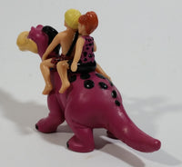 1990s U.C.S. and Amblin Dakin Hanna Barbera The Flintstones Pebbles and Bamm-Bamm Riding Dino PVC Toy Figure Cartoon TV Show Collectible