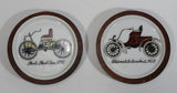 Vintage Set of 2 Porcelain Wood Cased 3" Diameter Coasters 'Ford's First Car, 1896' and Oldsmobile Runabout, 1903