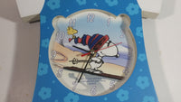 Extremely Rare and Unique Peanuts Snoopy Woodstock Downhill Skiing Blue Dress Shaped Musical Clock