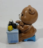 Cute Brown Bear Typing on Black Typewriter While Sitting At A Blue Desk Ceramic Figurine Made in Japan