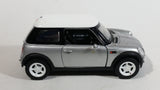 New Ray Mini Cooper Grey Silver Die Cast 1/43 Scale Pull Back Friction Motorized Toy Car Vehicle with Opening Doors - Damage to Drivers Side Headlight