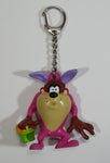 WBEI Warner Bros Looney Tunes Taz Wearing a Pink Easter Bunny Costume with Green Basket PVC Figurine Keychain Cartoon Collectible