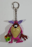 WBEI Warner Bros Looney Tunes Taz Wearing a Pink Easter Bunny Costume with Green Basket PVC Figurine Keychain Cartoon Collectible