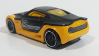 2014 Hot Wheels Ultimate Racing Symbolic Black and Orange #5 Die Cast Toy Car Vehicle