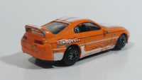 Motor Max Toyota Supra Orange and White No. 6012 Die Cast Toy Car Vehicle