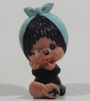 Vintage 1979 Sekiguchi Monchichi Girl Sitting with Blue Bonnet Head Scarf 2" Tall PVC Toy Figure