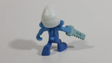 2011 Peyo "Carpenter" Smurf Holding a Saw with a Pencil in His Ear PVC Toy Figure McDonald's Happy Meal