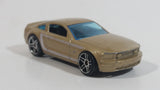 2007 Hot Wheels 2005 Ford Mustang GT Champagne Gold Die Cast Toy Car Vehicle