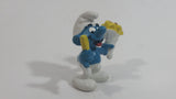 Vintage 1980 Peyo Smurf Character Holding and Eating French Fries PVC Toy Figure