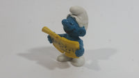 Vintage 1978 Peyo Smurf Character Singing and Holding Music Sheet PVC Toy Figure