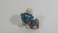 Vintage 1983 Peyo Smurf Character Talking on a Retro Rotary Red Telephone PVC Toy Figure