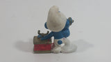 Vintage 1983 Peyo Smurf Character Talking on a Retro Rotary Red Telephone PVC Toy Figure