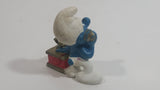 Vintage 1983 Peyo Smurf Character Talking on a Retro Rotary Red Telephone PVC Toy Figure