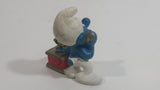 Vintage 1983 Peyo Smurf Character Talking on a Retro Rotary Red Telephone PVC Toy Figure