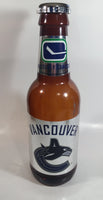 NHL Ice Hockey Vancouver Canucks 14" Tall Large Brown Plastic Bottle Shaped Coin Bank Sports Collectible Chrome Labels and Cap
