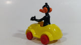 1989 Warner Bros Looney Tunes Daffy Duck in Yellow Plastic Toy Car Vehicle McDonald's Happy Meal