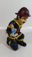 Fireman Firefighter Holding A Young Child Heavy Wine Bottle Holder Sculpture 9 1/2" Tall