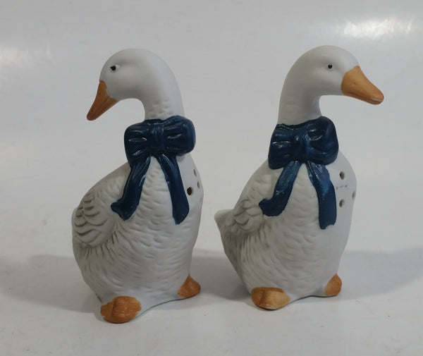 1990s Pair of White Goose Geese with Blue Bows Ceramic Salt and Pepper Shakers