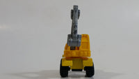 1997 M.M.T.L. Excavator Yellow Die Cast Toy Car Construction Vehicle