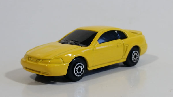 Maisto 1999 Ford Mustang Yellow Die Cast Toy Car Vehicle 1/64 Scale