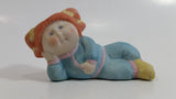 1984 OAA Cabbage Patch Kids Orange Hair Girl in Light Blue Laying Ceramic Figurine