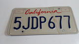 1996-97 California in Red on White with Blue Letters Vehicle License Plate 5JDP677