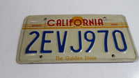 1982-1989 California in Red with Yellow Sun, Stripes and The Golden State on White with Blue Letters Vehicle License Plate 2EVJ970