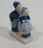 Vintage Delft Blue Holland Dutch Boy and Girl Kissing Hand Painted Ceramic Figurine