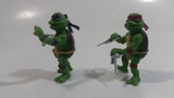 Lot of 2 2014 Ninja Turtles Donatello and Raphael Characters 1" Tall Mini Toy Action Figures