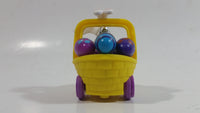 Very Hard To Find 2003 Hershey's Kisses Easter Bunny in Yellow Basket of Eggs Pull Back Friction Motorized Plastic Toy Car Vehicle