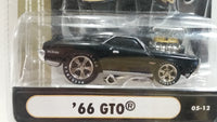 2005 Muscle Machines 5th Anniversary '66 GTO Black 1/64 Scale Die Cast Toy Car Vehicle New in Package