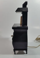Vintage Spartus Antique Style Black Pot Belly Stove Shaped Electric Plugin Clock