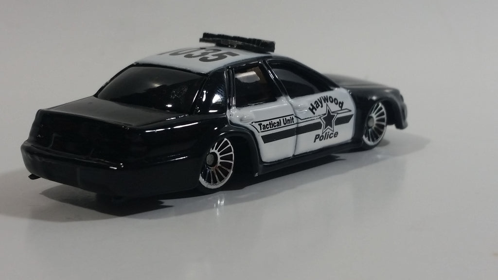 Maisto Ford Interceptor Haywood Police Tactical Unit 1035 Black and White Die Cast Toy Police Officer Cop Vehicle main image 0