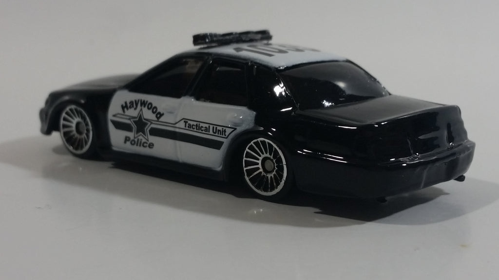 Maisto Ford Interceptor Haywood Police Tactical Unit 1035 Black and White Die Cast Toy Police Officer Cop Vehicle main image 1