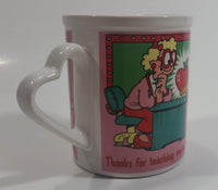 Enesco United Features Syndicate Jim Davis "Thanks for teaching me so good...er...well!" Garfield Giving Apple To Teacher Ceramic Coffee Mug with Heart Shaped Handle