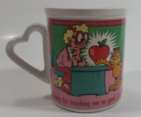 Enesco United Features Syndicate Jim Davis "Thanks for teaching me so good...er...well!" Garfield Giving Apple To Teacher Ceramic Coffee Mug with Heart Shaped Handle