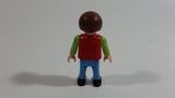 1995 Geobra Playmobil Brown Haired Boy Blue Pants Red Top Green Sleeves 2" Tall Toy Figure