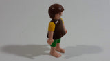 Geobra Playmobil Brown Haired Girl Green Shorts Brown Top Yellow Sleeves 2" Tall Toy Figure