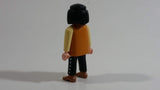 1994 Geobra Playmobil Black Haired Pirate Man Black Bottoms Tan Orange Top White Sleeves Stubble and Eye patch 3" Tall Toy Figure