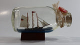Vintage Highly Detailed Miniature German Flagged Tall Ship in Cork Top 4 1/4" Long Glass Bottle
