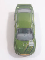 2010 Hot Wheels Nightburnerz 2008 Lancer Evolution Metallic Green Die Cast Toy Car Vehicle