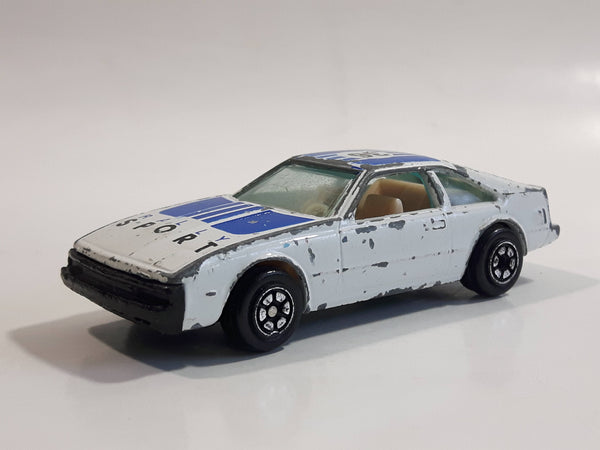 Vintage Yatming Toyota Celica Flying Engine #36 No. 1036 White Blue Rally Sport Die Cast Toy Race Car Vehicle